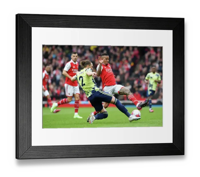 Framed Print : Arsenal vs Leeds United: Gabriel Jesus Tussles with Luke Ayling in Premier League Showdown (2022-23)