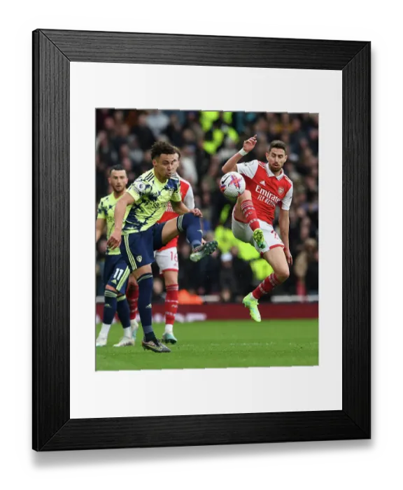 Framed Print : Arsenal vs Leeds United: Jorginho's Tackle Battle in the 2022-23 Premier League Clash