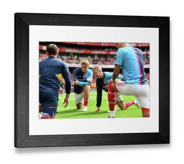 Framed Print : Arsenal FC vs Leeds United: Pre-Match Warm-Up at Emirates Stadium
