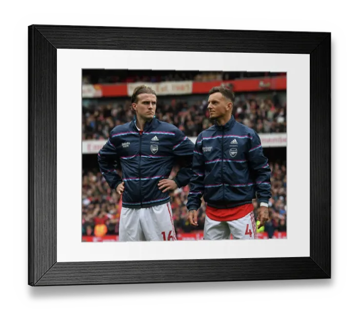 Framed Print : Arsenal's Holding and White Prepare for Leeds United Clash in Premier League (2022-23) Framed Print : Arsenal's Holding and White Prepare for Leeds United Clash in Premier League (2022-23)