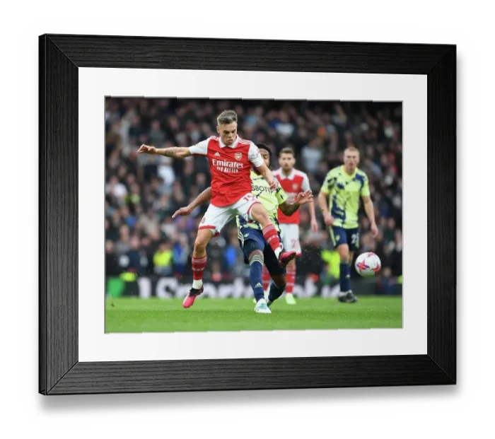 Framed Print : Arsenal vs Leeds United: Trossard Shines in the Premier League Clash at Emirates Stadium