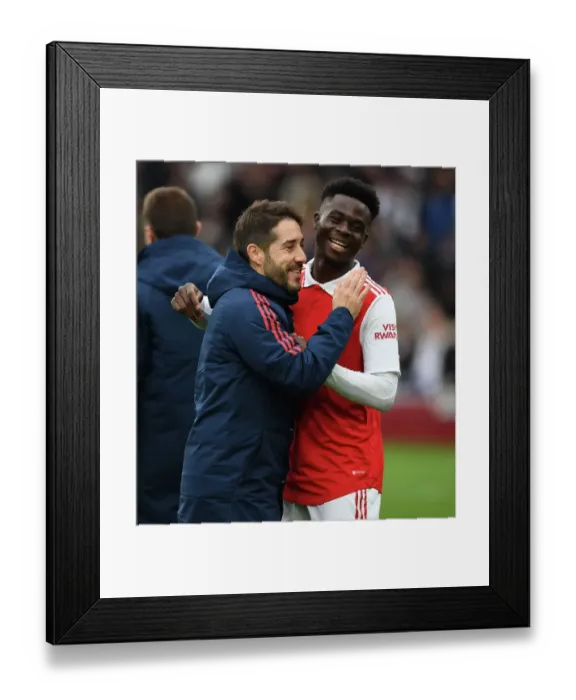 Framed Print : Arsenal's Nico Jover and Bukayo Saka: Victory Celebration vs Leeds United, April 2023