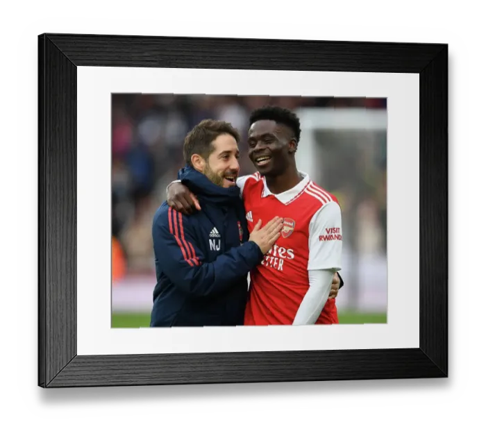 Framed Print : Arsenal's Victory Celebration: Nico Jover and Bukayo Saka Framed Print : Arsenal's Victory Celebration: Nico Jover and Bukayo Saka