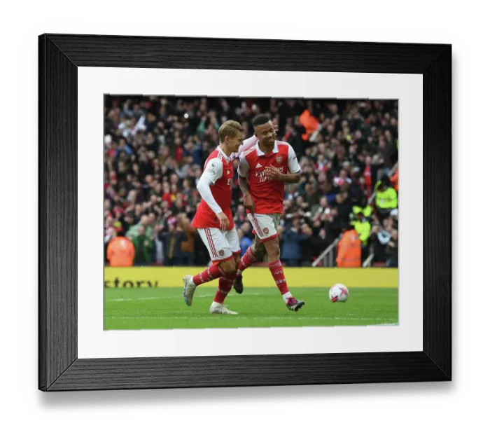 Framed Print : Arsenal: Jesus and Odegaard Celebrate First Goal in 2022-23 Premier League Win Against Leeds United