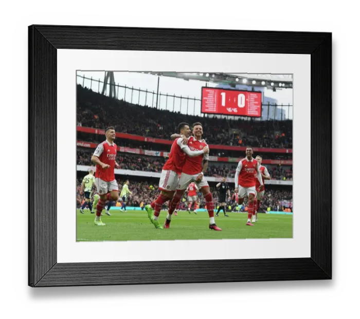 Framed Print : Arsenal's Ben White and Granit Xhaka Celebrate with Gabriel Martinelli: Arsenal FC vs Leeds United, Premier League 2022-23