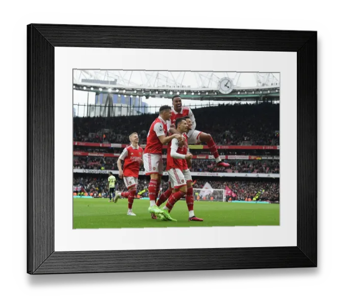 Framed Print : Arsenal's Ben White Scores and Celebrates with Team against Leeds United in the Premier League