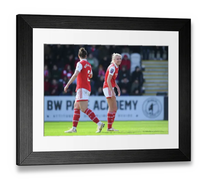 Framed Print : Arsenal Rivals: Williamson and Wubben-Moy in Intense Moment at FA Women's Super League Match