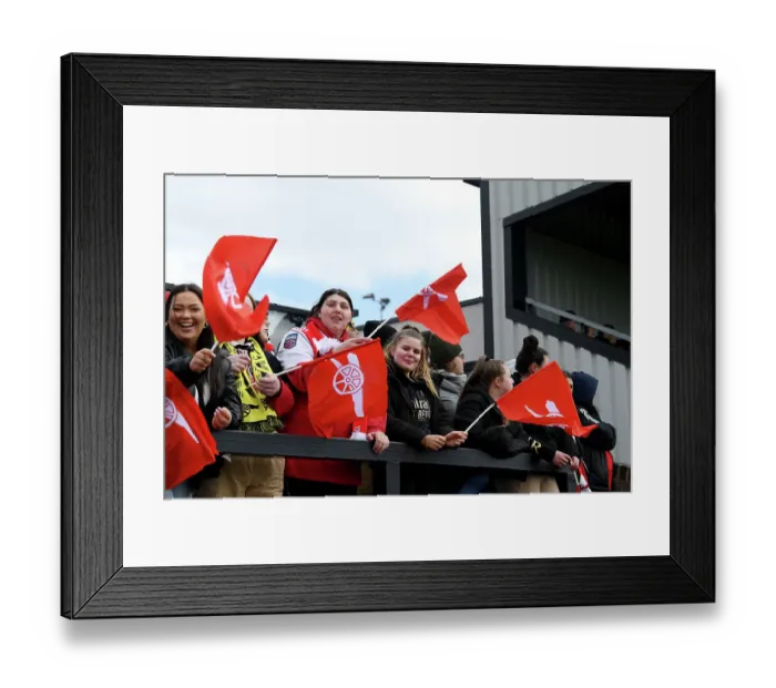 Framed Print : Arsenal vs Manchester City: Passionate Fans Wave Flags at FA Women's Super League Match Framed Print : Arsenal vs Manchester City: Passionate Fans Wave Flags at FA Women's Super League Match
