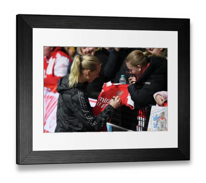 Framed Print : Arsenal's Stina Blackstenius Signs Shirt for Fan After Victory Over Manchester City