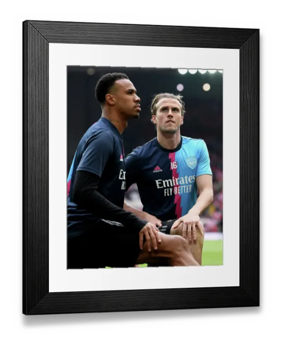 Framed Print : Arsenal Players Gabriel and Rob Holding Warm Up Ahead of Liverpool vs Arsenal Premier League Clash (2022-23)