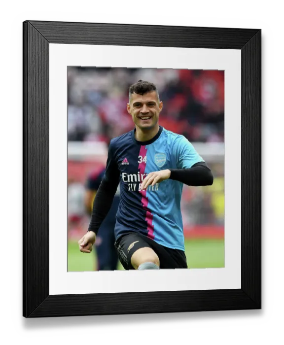 Framed Print : Granit Xhaka's Intense Pre-Match Focus: Arsenal vs. Liverpool, Premier League 2022-23