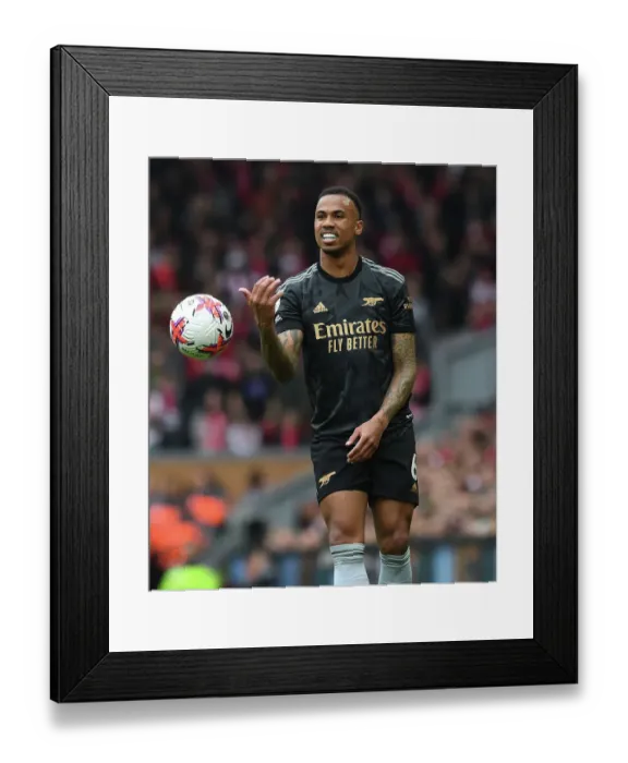 Framed Print : Arsenal's Gabriel Magalhaes Faces Off Against Liverpool in Premier League Battle, 2022-23