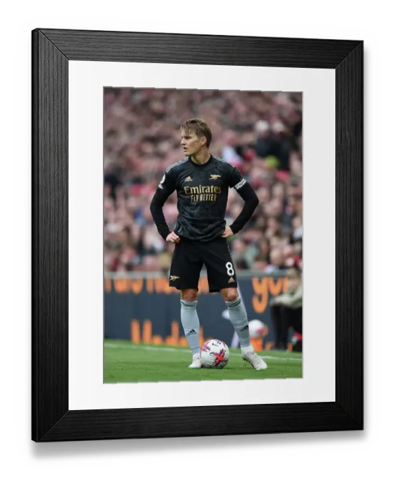 Framed Print : Arsenal's Martin Odegaard Goes Head-to-Head with Liverpool in Premier League Battle (2022-23) Framed Print : Arsenal's Martin Odegaard Goes Head-to-Head with Liverpool in Premier League Battle (2022-23)
