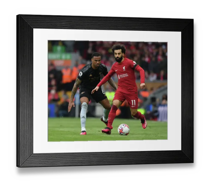 Framed Print : Magalhães vs. Salah: A Premier League Battle at Anfield - Liverpool vs. Arsenal, 2022-23