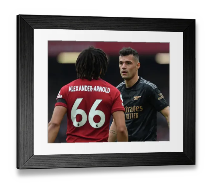 Framed Print : Intense Rivalry: Xhaka vs. Alexander-Arnold - A Battle of Wits at Anfield, Premier League 2022-23: Granit Xhaka and Trent Alexander-Arnold Lock Horns in Epic Showdown