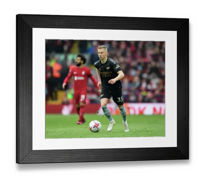 Framed Print : Arsenal's Oleksandr Zinchenko Faces Off Against Liverpool in the Premier League Framed Print : Arsenal's Oleksandr Zinchenko Faces Off Against Liverpool in the Premier League