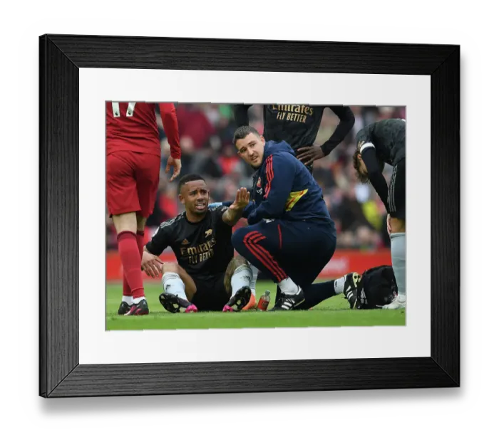 Framed Print : Gabriel Jesus Injury: Arsenal Star Receives Medical Attention During Liverpool vs. Arsenal, Premier League 2022-23