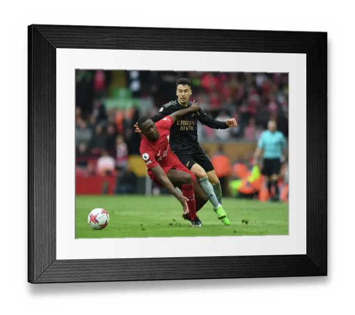 Framed Print : Martinelli vs. Konate: A Premier League Showdown at Anfield (2022-23) - Arsenal Forward vs. Liverpool Defender Clash