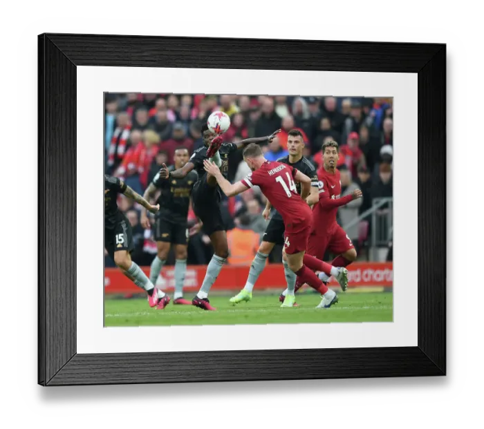 Framed Print : Thomas Partey vs. Jordan Henderson: Intense Battle at Anfield - Liverpool vs. Arsenal, Premier League 2022-23 Framed Print : Thomas Partey vs. Jordan Henderson: Intense Battle at Anfield - Liverpool vs. Arsenal, Premier League 2022-23