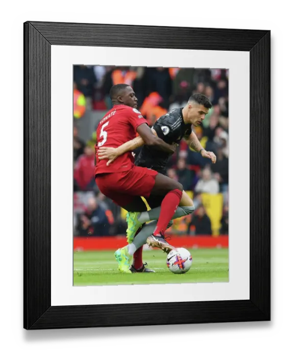 Framed Print : Xhaka vs Konate: Intense Clash Between Liverpool and Arsenal in Premier League Showdown Framed Print : Xhaka vs Konate: Intense Clash Between Liverpool and Arsenal in Premier League Showdown