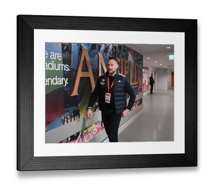 Framed Print : Arsenal's Security Guard Braces for Liverpool-Arsenal Clash in Premier League (2022-23)
