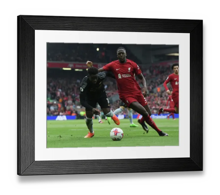 Framed Print : Clash at Anfield: Liverpool vs. Arsenal - Bukayo Saka vs. Ibrahim Konate Battle Framed Print : Clash at Anfield: Liverpool vs. Arsenal - Bukayo Saka vs. Ibrahim Konate Battle