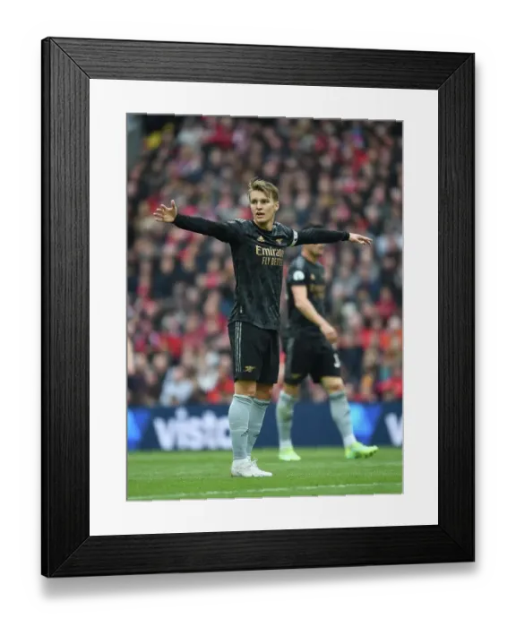 Framed Print : Arsenal's Odegaard Clashes with Liverpool in Premier League Battle (2022-23)