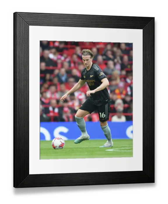 Framed Print : Rob Holding's Determined Showdown: Arsenal vs Liverpool's Intense Premier League Clash Framed Print : Rob Holding's Determined Showdown: Arsenal vs Liverpool's Intense Premier League Clash