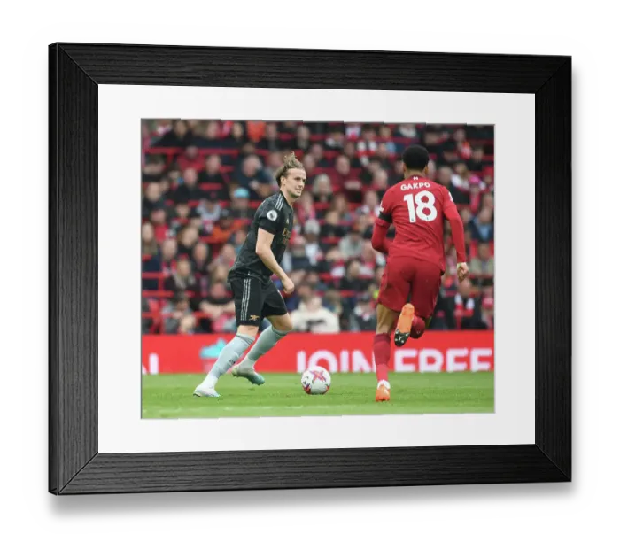 Framed Print : Rob Holding's Defiant Showdown: Arsenal vs. Liverpool's Premier League Clash Framed Print : Rob Holding's Defiant Showdown: Arsenal vs. Liverpool's Premier League Clash