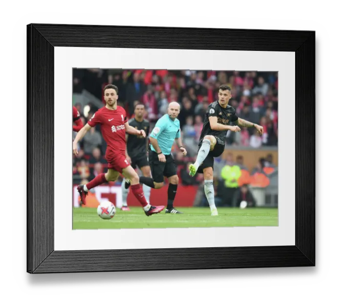 Framed Print : Granit Xhaka: Midfield Warrior in the Liverpool vs. Arsenal Battle, Premier League 2022-23