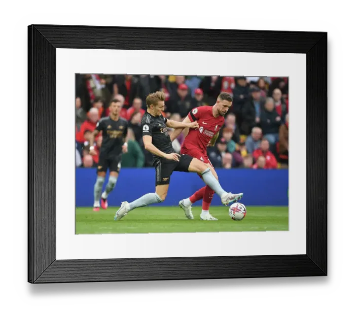 Framed Print : Martin Odegaard vs. Jordan Henderson: A Premier League Battle at Anfield, 2022-23