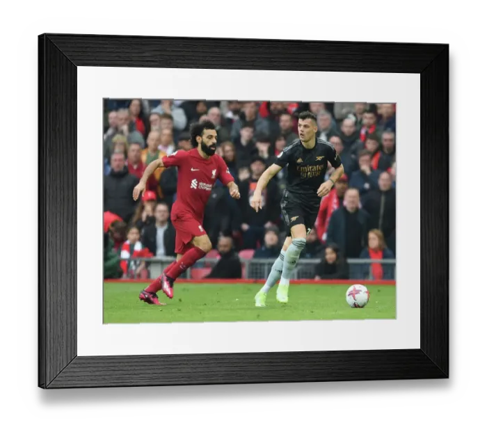 Framed Print : Xhaka vs Salah: Intense Battle at Anfield - Liverpool vs Arsenal, Premier League 2022-23