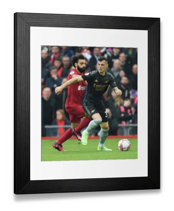 Framed Print : Xhaka vs. Salah: Battle at Anfield - Liverpool vs. Arsenal, Premier League 2022-23 Framed Print : Xhaka vs. Salah: Battle at Anfield - Liverpool vs. Arsenal, Premier League 2022-23