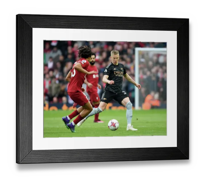 Framed Print : Clash at Anfield: Premier League Battle between Liverpool and Arsenal