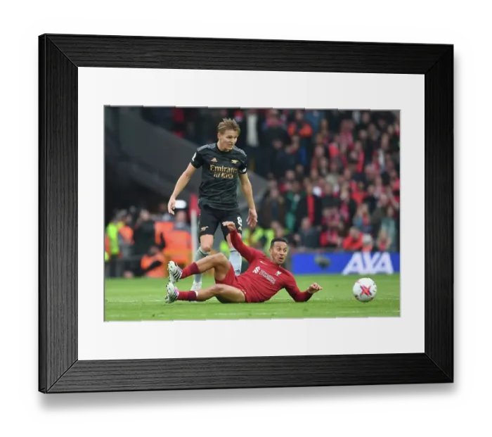 Framed Print : Arsenal's Martin Odegaard Faces Off Against Liverpool in Premier League Showdown (2022-23)
