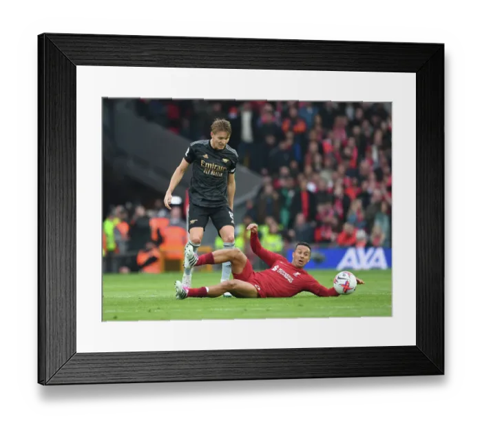 Framed Print : Martin Odegaard vs Liverpool: Premier League Showdown (2022-23)