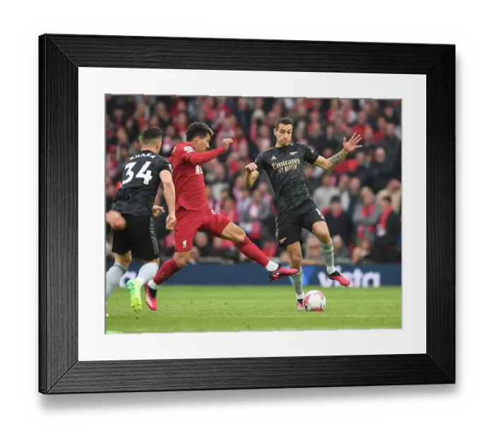 Framed Print : Clash at Anfield: Kiwior vs. Firmino - A Premier League Battle Framed Print : Clash at Anfield: Kiwior vs. Firmino - A Premier League Battle