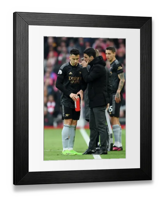Framed Print : Arsenal's Martinelli and Mikel Arteta in Deep Conversation at Anfield During Liverpool vs Arsenal Premier League Match (2022-23) Framed Print : Arsenal's Martinelli and Mikel Arteta in Deep Conversation at Anfield During Liverpool vs Arsenal Premier League Match (2022-23)