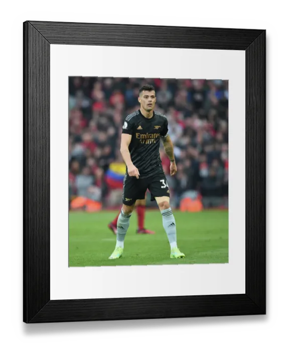 Framed Print : Intense Midfield Battle: Granit Xhaka Fights It Out Against Liverpool in the Premier League 2022-23