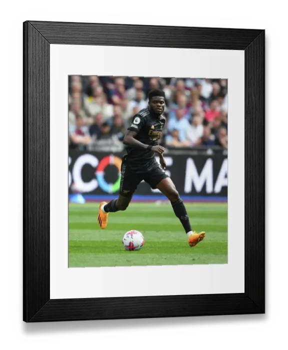 Framed Print : Thomas Partey in Action: Arsenal vs. West Ham United, Premier League 2022-23 Framed Print : Thomas Partey in Action: Arsenal vs. West Ham United, Premier League 2022-23