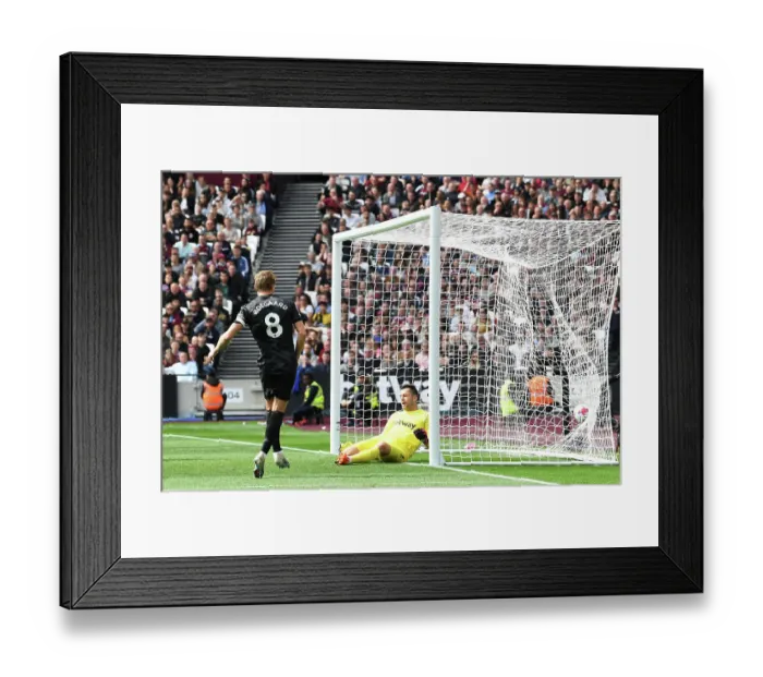 Framed Print : Martin Odegaard Scores Thrilling Second Goal: Arsenal's Victory at London Stadium vs. West Ham United (April 2023)