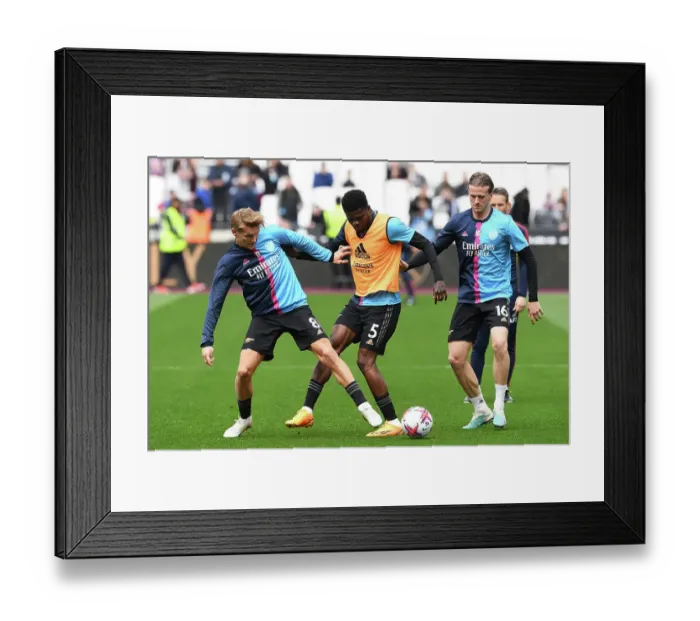 Framed Print : Arsenal Players Martin Odegaard, Thomas Partey, and Rob Holding Warm Up Ahead of West Ham United Match, Premier League 2022-23 Framed Print : Arsenal Players Martin Odegaard, Thomas Partey, and Rob Holding Warm Up Ahead of West Ham United Match, Premier League 2022-23