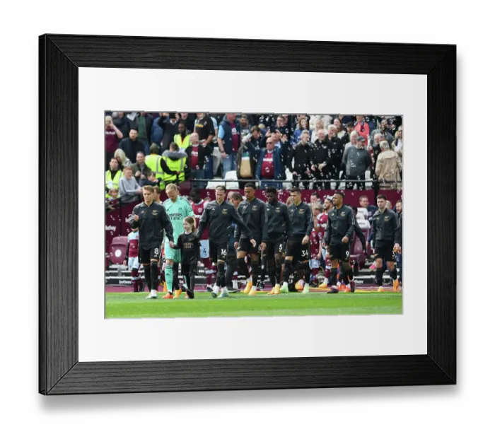 Framed Print : Arsenal's Martin Odegaard Leads Team onto London Stadium Pitch vs West Ham United (2022-23) Framed Print : Arsenal's Martin Odegaard Leads Team onto London Stadium Pitch vs West Ham United (2022-23)