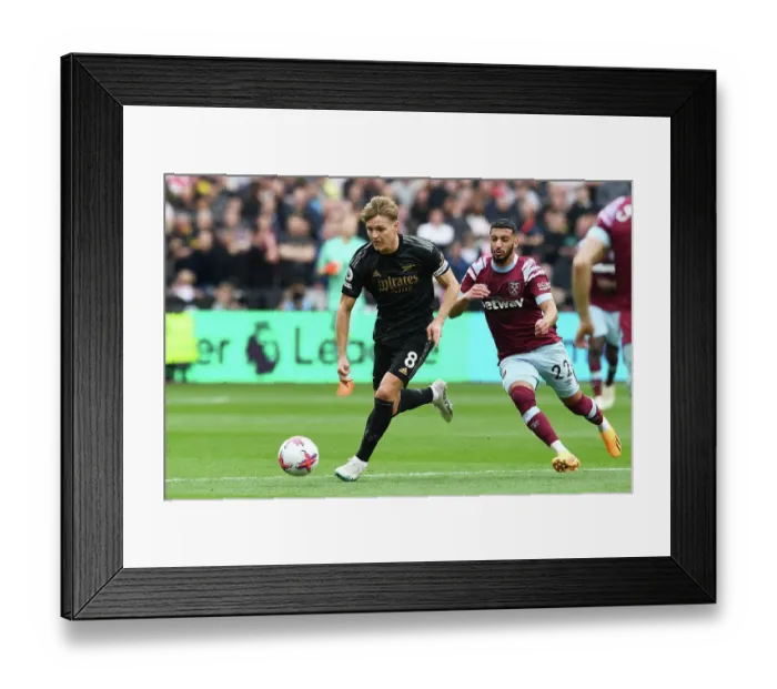 Framed Print : Battle for Possession: Arsenal's Martin Odegaard vs. West Ham's Said Benrahma Framed Print : Battle for Possession: Arsenal's Martin Odegaard vs. West Ham's Said Benrahma