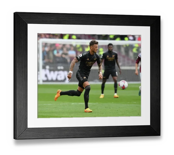 Framed Print : Ben White's Steadfast Performance: Arsenal Holds Ground Against West Ham in Intense Premier League Battle (2022-23)