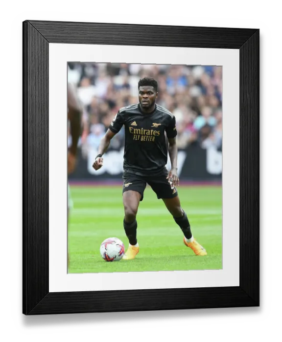 Framed Print : Thomas Partey in Action: Arsenal vs. West Ham United, Premier League 2022-23 Framed Print : Thomas Partey in Action: Arsenal vs. West Ham United, Premier League 2022-23