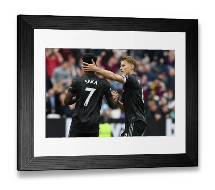 Framed Print : Agonizing Moment: Odegaard Consoles Saka After Missed Penalty in West Ham vs. Arsenal Clash Framed Print : Agonizing Moment: Odegaard Consoles Saka After Missed Penalty in West Ham vs. Arsenal Clash