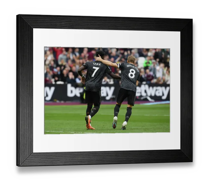 Framed Print : Arsenal's Agony: Odegaard Consoles Saka After Missed Penalty vs West Ham United (2022-23)