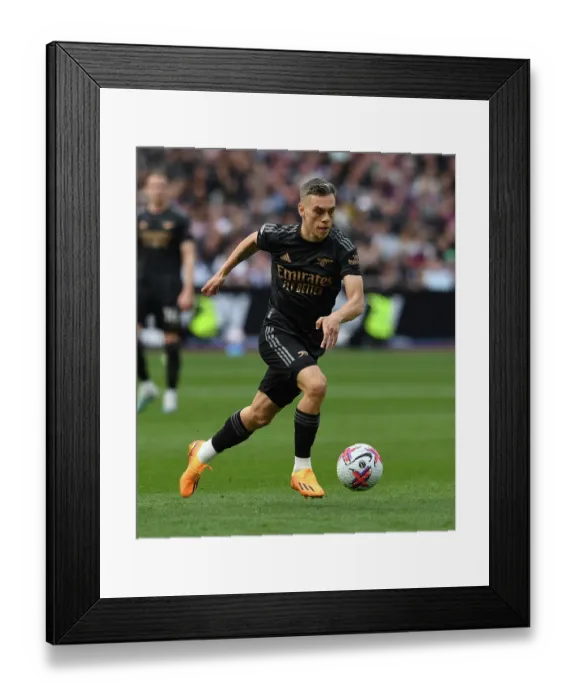 Framed Print : Arsenal's Trossard Faces Off Against West Ham in Premier League Clash Framed Print : Arsenal's Trossard Faces Off Against West Ham in Premier League Clash