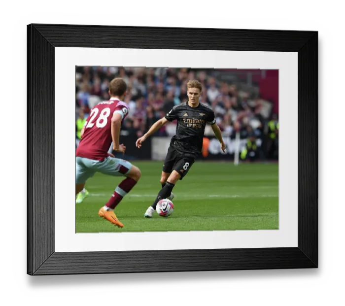 Framed Print : Clash at London Stadium: Arsenal's Martin Odegaard vs. West Ham's Tomas Soucek Framed Print : Clash at London Stadium: Arsenal's Martin Odegaard vs. West Ham's Tomas Soucek